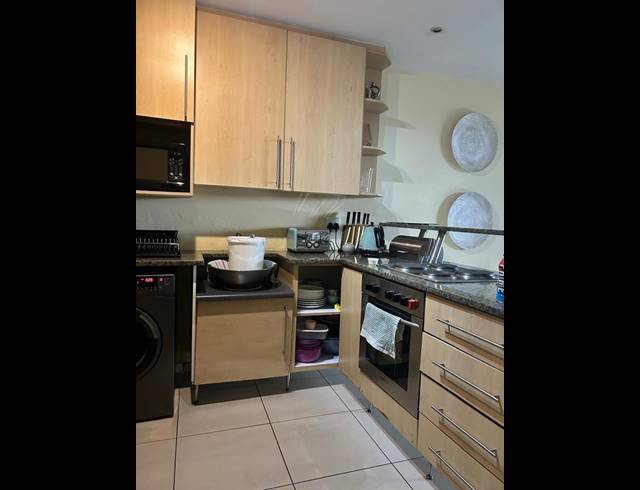 2 BEDROOM APARTMENT FOR SALE IN ROOIHUISKRAAL NORTH